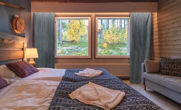 Фото номера Двухместный номер с 2 отдельными кроватями Отель Hotel Jeris г. Муонио 7