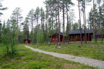 Фото номера Коттедж с сауной и спальней (для 2 взрослых) Дома для отпуска Hotel Jeris Log Cabins г. Муонио 12